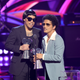 (L-R) Anderson .Paak and Bruno Mars of Silk Sonic accept Best Duo/Group of the Year onstage at the 2022 iHeartRadio Music Awards at The Shrine Auditorium in Los Angeles, California on March 22, 2022. (Photo by Matt Winkelmeyer/Getty Images)